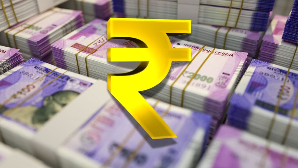 Symbol of the Indian Rupee and Bundles of currency notes to represent Arthan Finance Series B funding.